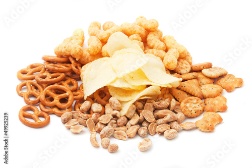 Photo: Salty snacks isolated on white Salty snacks isolated on white