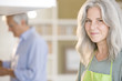 Mature couple preparing food