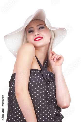 Photo: Attractive woman with hat smiling, isolated on white Attractive woman with hat smiling, isolated on white