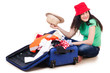 Young girl packing for vacation