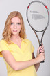 teenager holding a tennis racket