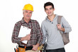 Builder welcoming trainee