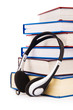 Concept of audio books with earphones on white
