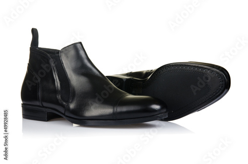 Photo: Fashion concept with male shoes on white Fashion concept with male shoes on white