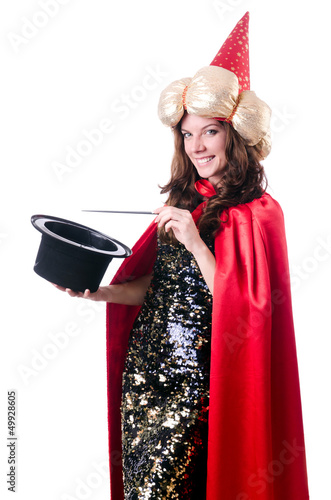 Photo: Female magician isolated on white Female magician isolated on white
