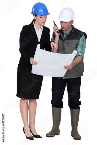 Photo: Architect and foreman working together Architect and foreman working together
