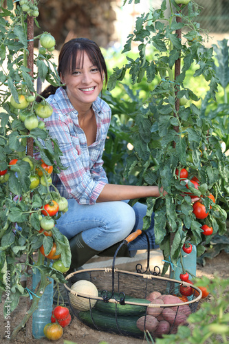 Photo: Woman growing vegetables Woman growing vegetables