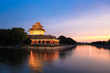 the turret of forbidden city in sunset