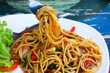 canvas print picture - Spicy seafood spaghetti with many kind of herbs