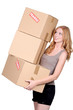 Woman carrying cartons