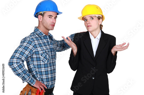 Photo: Upset worker and architect Upset worker and architect