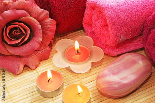 Photo: Towels, soaps, flowers, candles Towels, soaps, flowers, candles