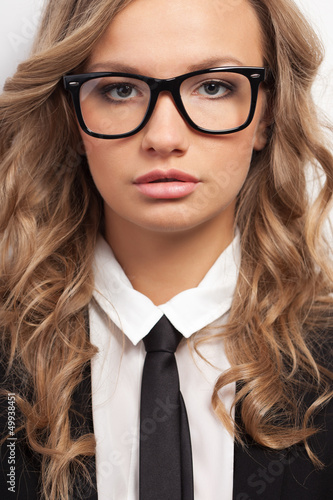 Photo: closeup seriously businesswoman portrait closeup seriously businesswoman portrait