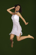 young girl jumping on a trampoline