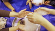 Children take the safe hands of edible foam.