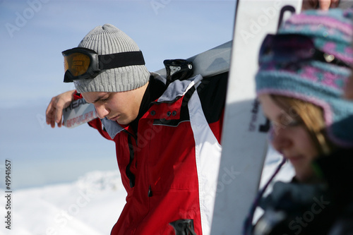 Photo: Young couple skiing Young couple skiing