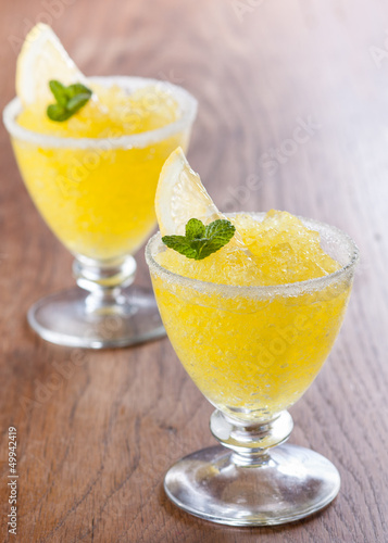 Photo: Lemon slushie cups decorated with mint Lemon slushie cups decorated with mint