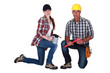 craftsman and craftswoman posing together