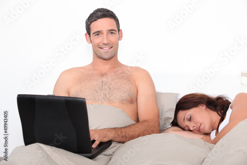 Photo: Couple in bed Couple in bed