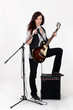 female singer with guitar