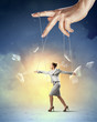 Business woman marionette