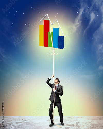 Photo: Image of businessman climbing rope Image of businessman climbing rope