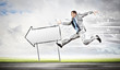 Businessman running on the road