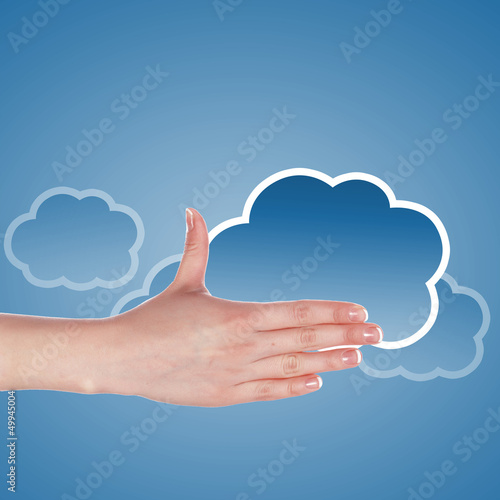 Photo: Hand with cloud computing symbol Hand with cloud computing symbol