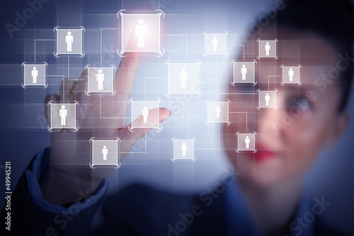 Photo: Image of female touching icon of social network Image of female touching icon of social network