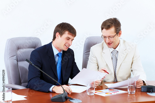 Photo: Two businessmen at meeting Two businessmen at meeting