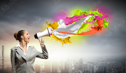 Photo: businesswoman with megaphone businesswoman with megaphone
