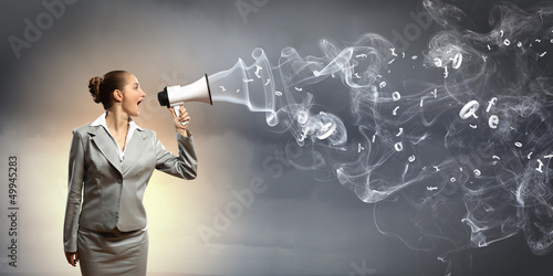 Photo: businesswoman with megaphone businesswoman with megaphone