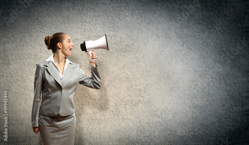 Photo: businesswoman with megaphone businesswoman with megaphone