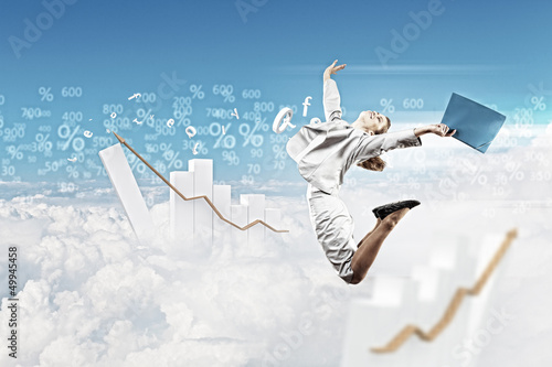 Photo: Image of jumping businesswoman Image of jumping businesswoman