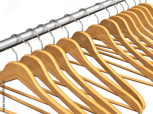 Illustration: Wooden coat hangers on clothes rail Wooden coat hangers on clothes rail