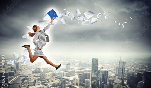 Photo: Image of running businesswoman Image of running businesswoman