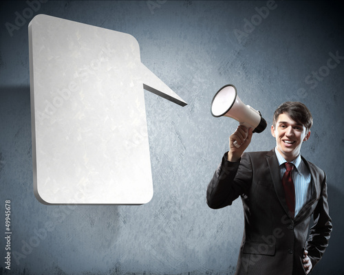 Photo: businessman with megaphone businessman with megaphone