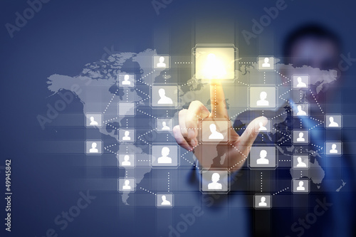 Photo: Image of male touching icon of social network Image of male touching icon of social network