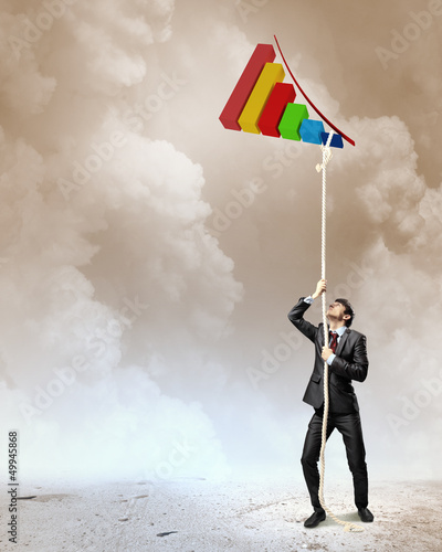 Photo: Image of businessman climbing rope Image of businessman climbing rope
