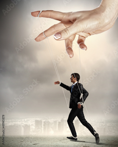 Photo: Business man marionette Business man marionette