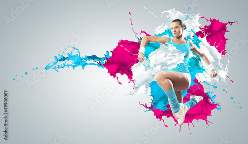 Photo: Image of sport woman jumping Image of sport woman jumping