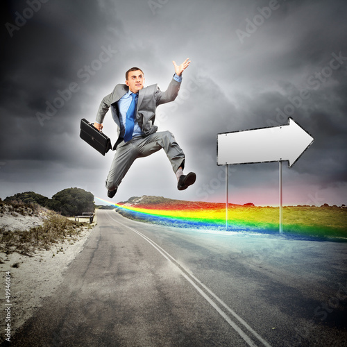 Photo: Businessman running on the road Businessman running on the road