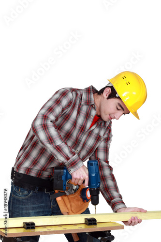 Photo: Man drilling Man drilling