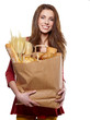 girl holding a bag of food