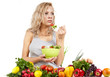 The young beautiful woman with the fresh vegetables