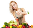 The young beautiful woman with the fresh vegetables