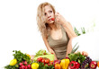 The young beautiful woman with the fresh vegetables