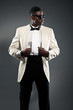 Stylish black american man in suit with sunglasses. Fashion stud