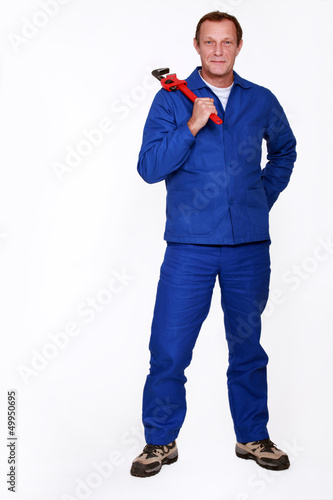 Photo: Man with wrench Man with wrench
