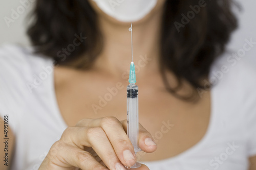 Photo: Krankenschwester mit Spritze Krankenschwester mit Spritze